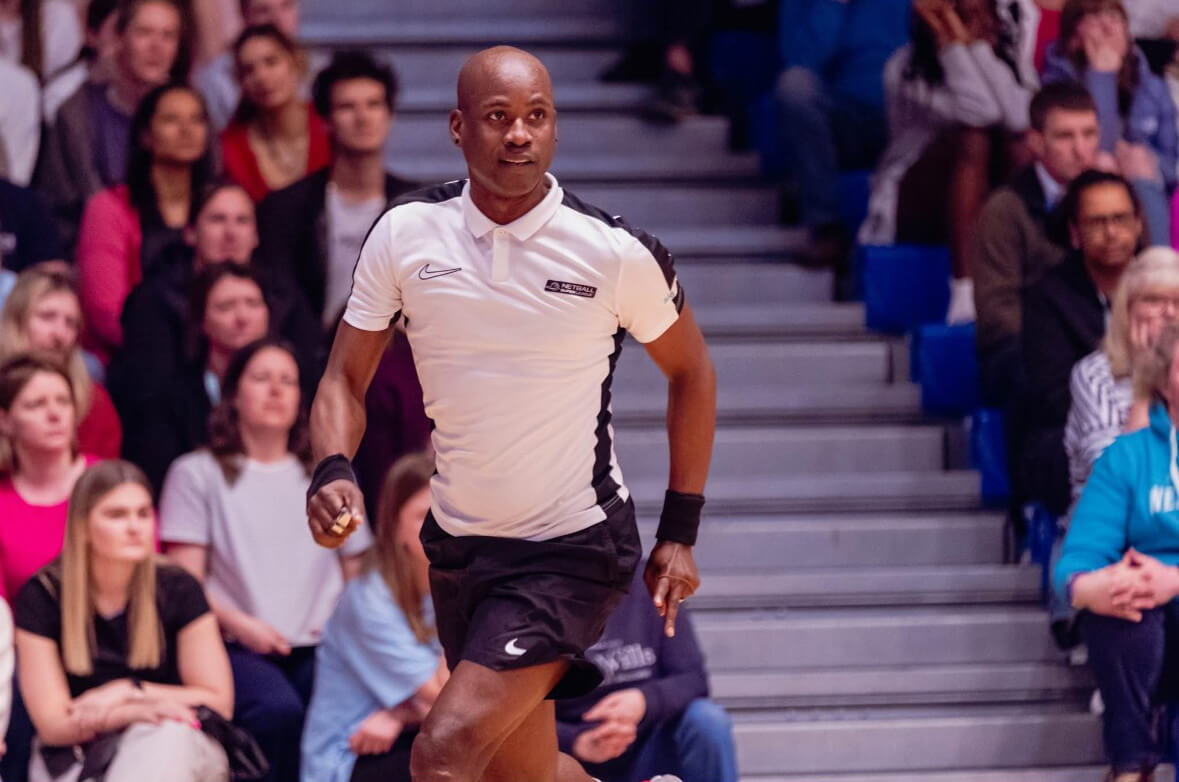 Male umpire at a netball match.